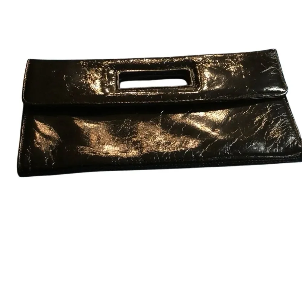 Gap black shiny clutch with zebra print inside